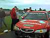 Mark and Andy inspect the car