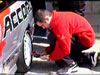 Tim Sopp checking tyres